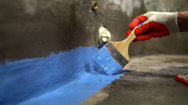 SJ Waterproofing Pros commercial waterproofing team near Falkville, AL